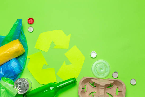 istock Eco concept with recycling symbol on table background top view 1410246602