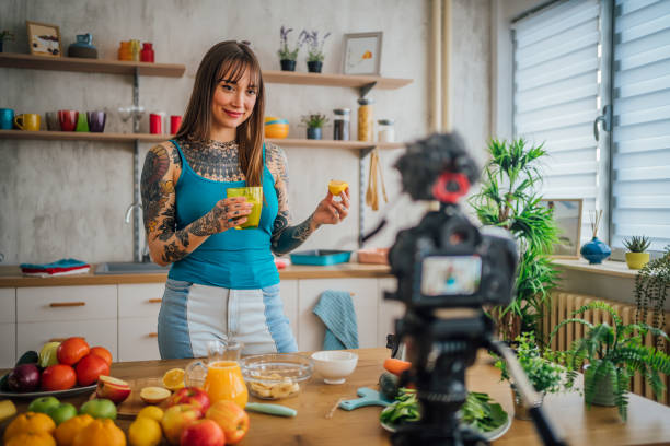 istock Woman vlogging about healthy smoothies recipes 1410247977