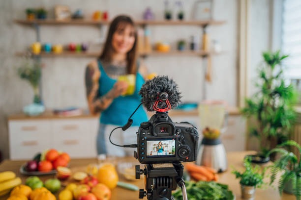 istock Woman vlogging about healthy smoothies recipes 1410248019