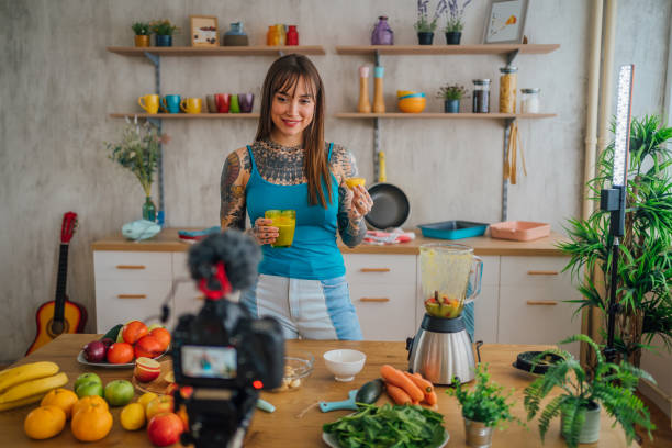 istock Woman vlogging about healthy smoothies recipes 1410248040