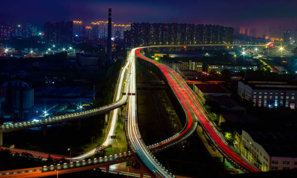 istock Traffic light scene of expressway at night 1410255937