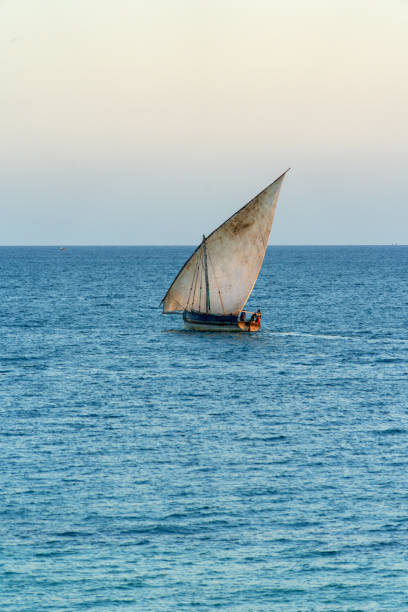 Boat at the beach on Zanzibar Island with stunning turquoise water