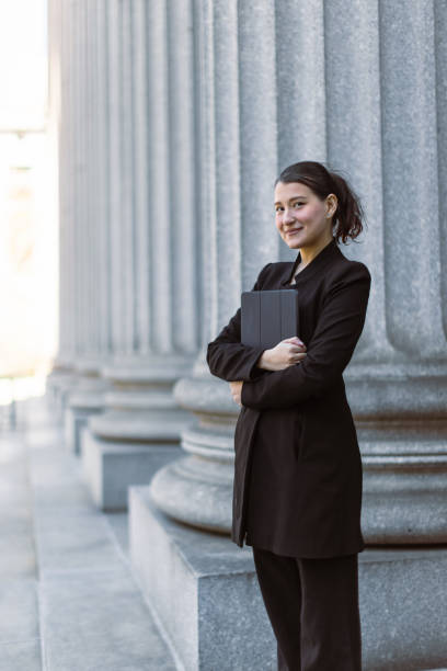 Female lawyer Hispanic latin female lawyer in front of the court house. Downtown Manhattan, New York, USA real estate outdoors vertical usa stock pictures, royalty-free photos & images