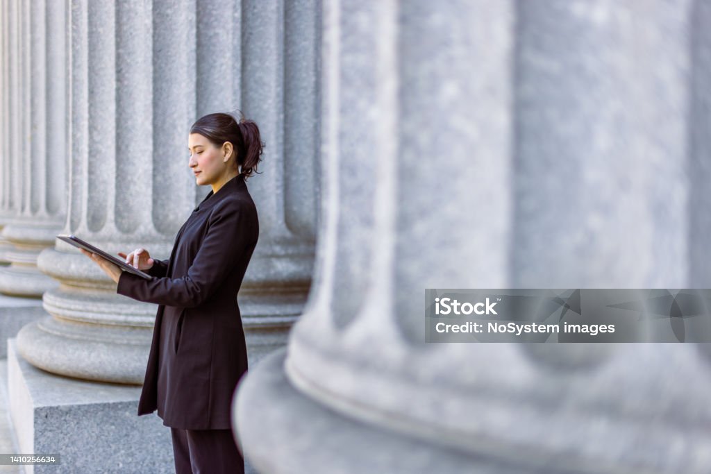 Female lawyer Hispanic latin female lawyer in front of the court house. Downtown Manhattan, New York, USA Government Stock Photo