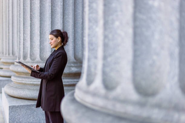 Female lawyer Hispanic latin female lawyer in front of the court house. Downtown Manhattan, New York, USA politics stock pictures, royalty-free photos & images