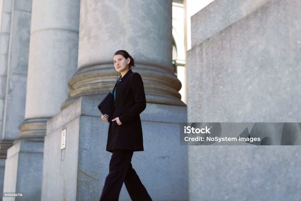 Female lawyer Hispanic latin female lawyer in front of the court house. Downtown Manhattan, New York, USA Government Stock Photo