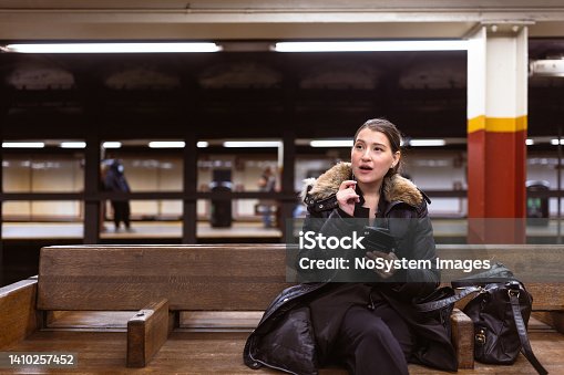 istock Catching train after work 1410257452