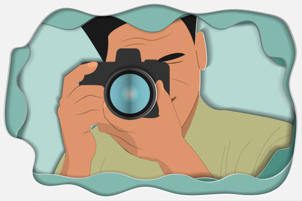 istock a postcard cut out of paper. photographer with a camera. 1410260818