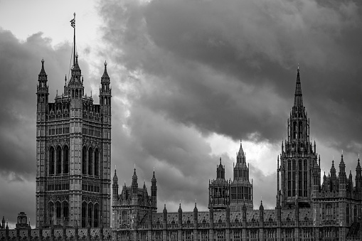 The towers of The Houses of Parliament in Westminster, London, England.  They have recently been refurbished and have spent 3 years hidden behind scaffolding, the newly cleaned building is looking exceptionally bright.