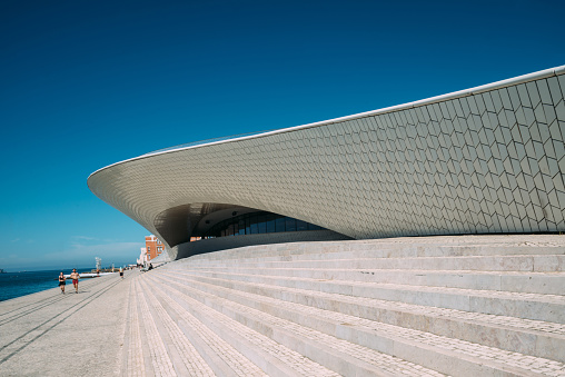Lisbon, Portugal - July 21, 2022: Facade of MAAT - Museum of Art, Architecture and Technology in Lisbon, Portugal next to the Tagus River