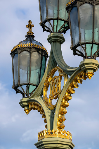 The ornate street lights on Westminster Bridge, near the Houses of Parliament, London, England, UK.
