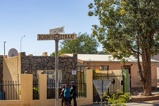 Korinthier Street in Windhoek at Khomas Region, Namibia, with people walking in the background.