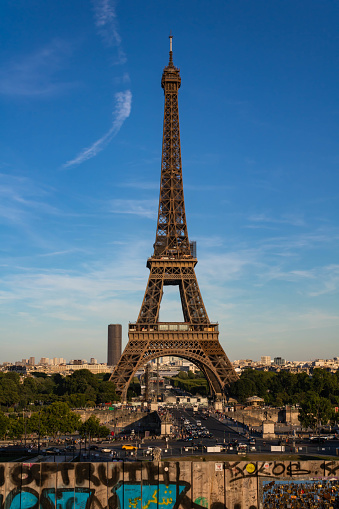 Paris, France - July 12 2022: Eiffel tower in Paris, blue sky background