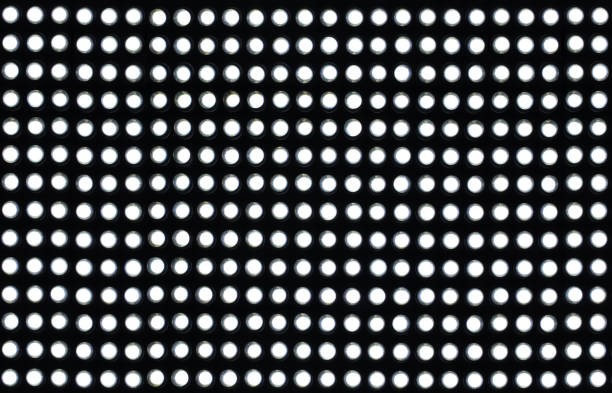 istock Recurring pattern of white LED lights on a black background. Wallpaper 1410273255