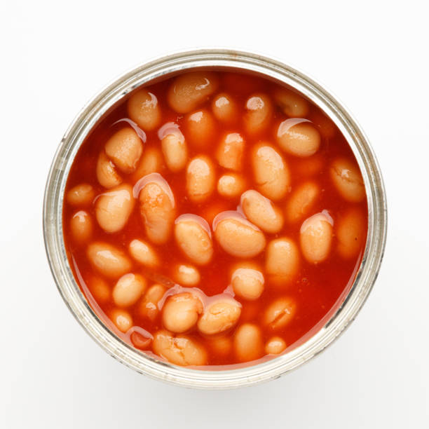 istock Canned beans in tomato sauce on a white background. 1410284044