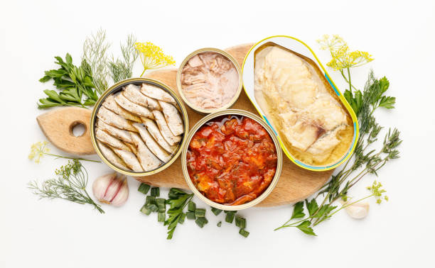 istock Processed fish in tins on a white background. Canned food. 1410284047