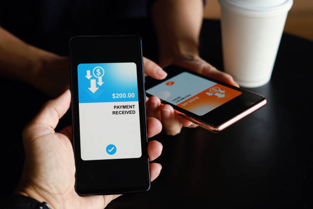 istock Transferring money via mobile banking app 1410285333