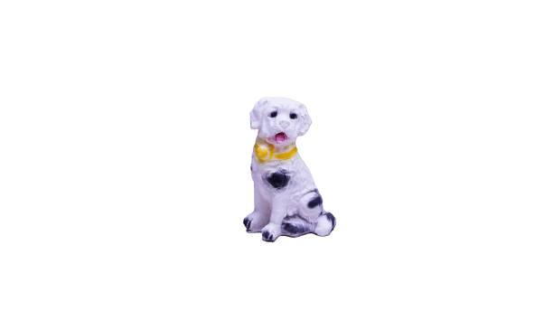 istock plaster garden decoration trinket dog statue white background 1410287595