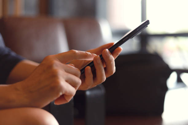 istock Close-up image of a woman using smart phone 1410290683