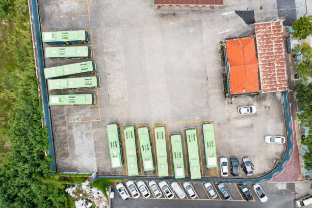 istock Electric bus parking lot top view 1410292190