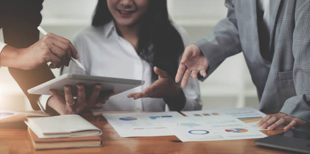 istock Business Corporate team brainstorming with chart and checking and analysis 1410292599