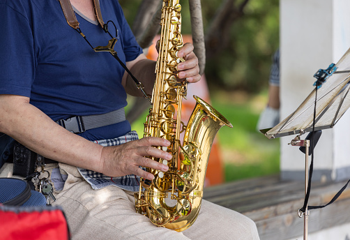 International jazz day and World Jazz festival. Saxophone, music instrument played by saxophonist player musician in fest.