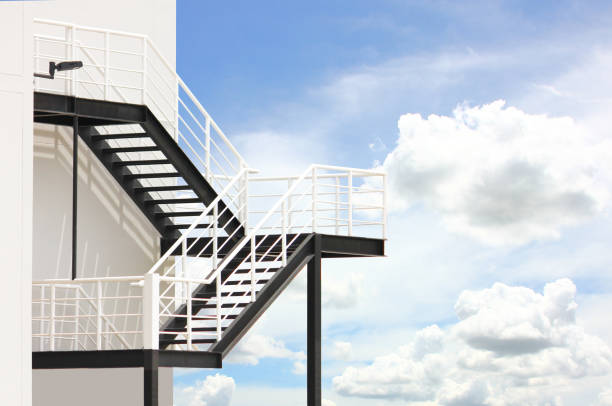 istock iron stairs blue sky . geometric steel parttern nature background. 1410294110