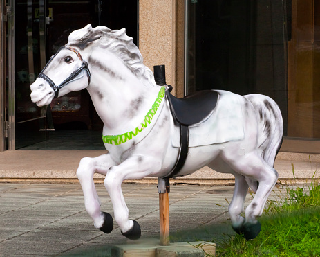 Swedish dalahorse figurine on a white background.