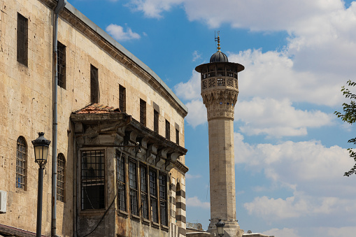 Historical mosque minaret with blue sky. Mosque view in Gaziantep,Turkey