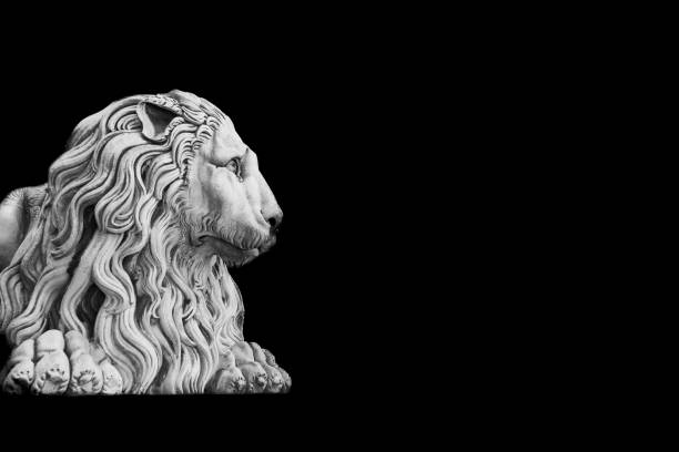 istock Antique lion statue , made of stone, with copy space. Concept security, safety, guard. 1410299635