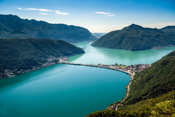 Lugano Lake Lugano Lake with Italy in the background. lugano stock pictures, royalty-free photos & images