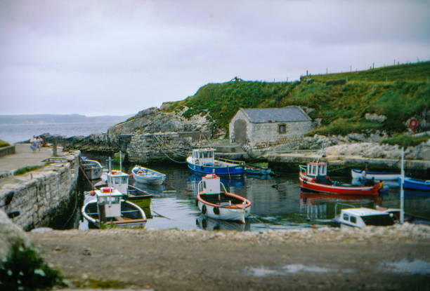 1980s old Positive Film scanned, fishing port near Giant's Causeway, County Antrim, Northern Ireland stock photo