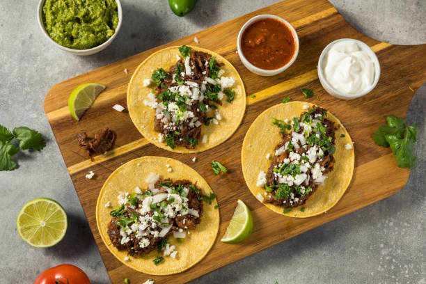 istock Homemade Mexican Shredded Beef Tacos 1410312418