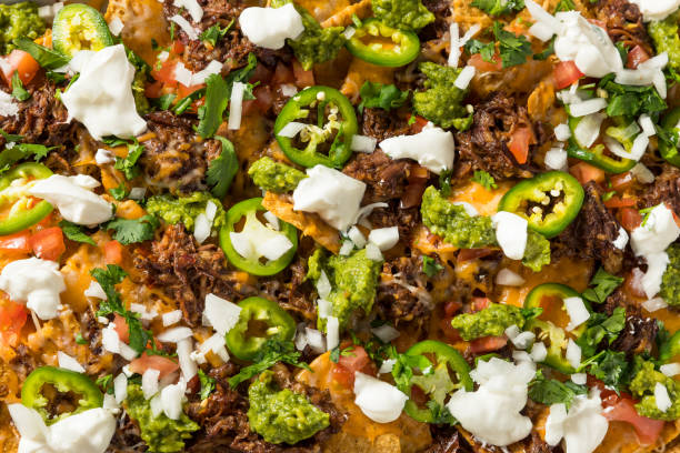 istock Homemade Mexican Shredded Beef Nachos 1410313198