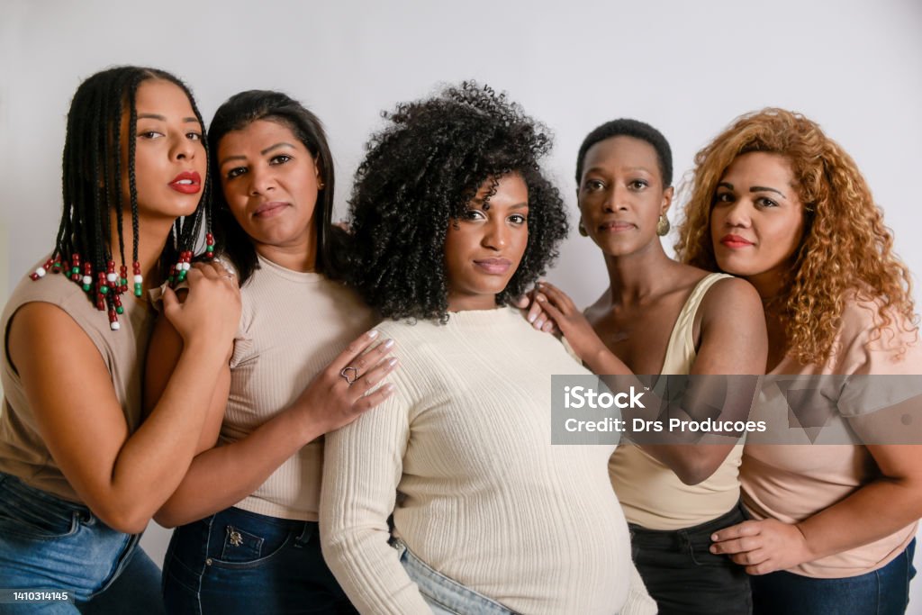 Beautiful Latin American black women on a white background Women Stock Photo
