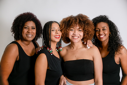 Beautiful Latin American black women on a white background