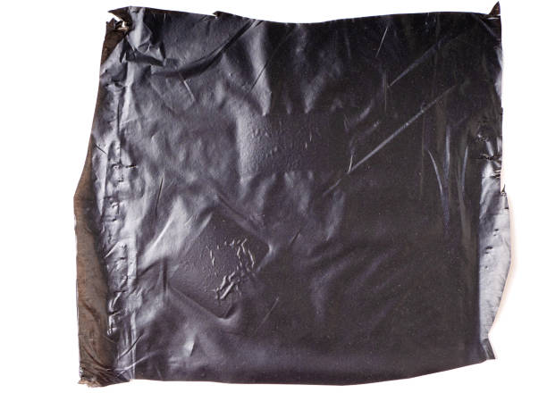 istock Abstract background made of black plastic film 1410314973