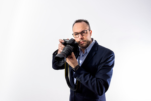 photographer posing as a model with his camera