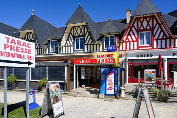 Press House / tobacco shop in the centre of Sables D'or, Brittany Sables D'or, France,  July 5, 2022 - Press House / tobacco shop in the centre of Sables D'or, Brittany frehal photos stock pictures, royalty-free photos & images