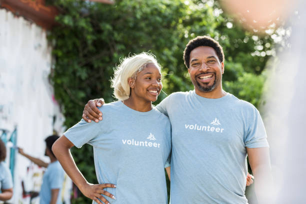 istock Portrait dad and daughter volunteers 1410319931