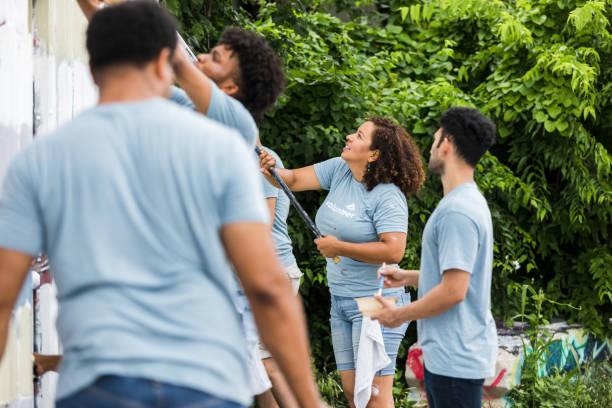 istock Diverse volunteers work together to beautiful local park 1410319977