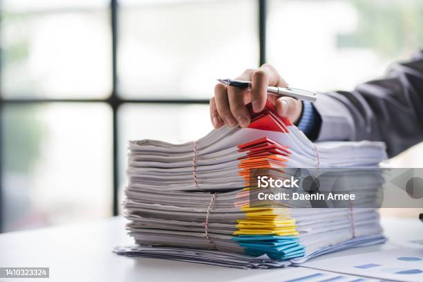 Business Documents Businessman Check Legal Document Review Prepare Documents Or Analysis Reports Tax Items Accounting Documents Data Contracts Office Partner Agreements Stock Photo - Download Image Now