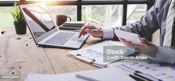 Portrait Of A Businessman Working On A Tablet Computer In A Modern Office Make An Account Analysis Report Real Estate Investment Information Financial And Tax System Concepts Stock Photo - Download Image Now