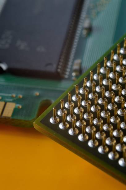 istock microprocessor on the background of the microcircuit of the motherboard. 1410325431