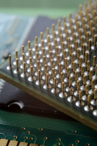 istock microprocessor on the background of the microcircuit of the motherboard. 1410325499