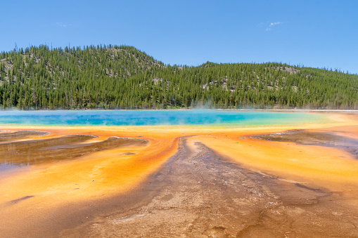 The vibrant colors of Grand Prismatic Spring in Yellowstone National Park draw visitors from around the world.