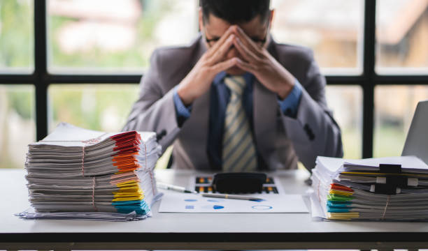 istock business documents businessman check legal document review Prepare documents or analysis reports, tax items, accounting documents, data contracts, office partner agreements. 1410326469