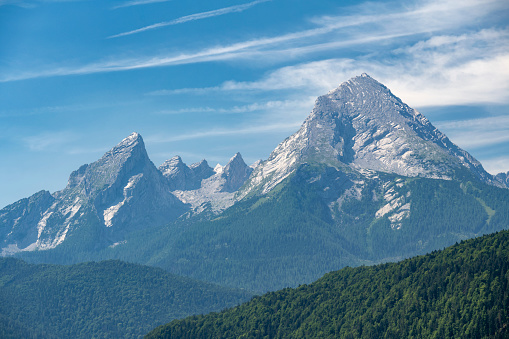 The Watzmann is a mountain in the Berchtesgaden Alps south of the village of Berchtesgaden. It is the third highest in Germany, and the highest located entirely on German territory.