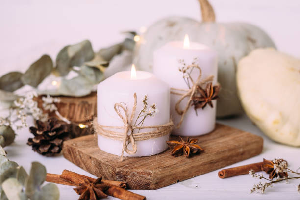 istock Autumn composition with pumpkin and candles. Beautiful autumn decor. 1410328625