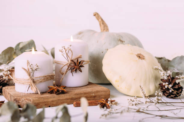 istock Autumn composition with pumpkin and candles. Beautiful autumn decor. 1410328626